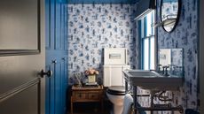 Blue toile style wallpaper, blue walls and ceiling, trad basin, vintage side table, stripe blinds examples blue small bathroom ideas