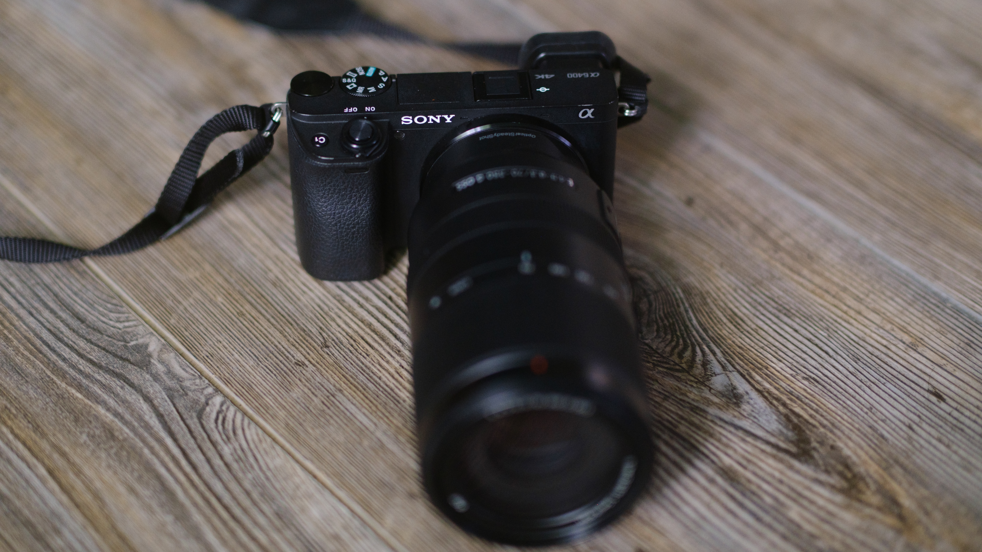 The Sony A6400 on a wood background