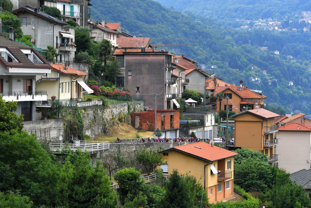 COLICO ITALY JULY 07 The peloton passing through a landscape during the 32nd Giro dItalia Internazionale Femminile 2021 Stage 6 a 155km stage from Colico to Colico Village GiroDonne UCIWWT on July 07 2021 in Colico Italy Photo by Luc ClaessenGetty Images