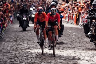 Paris, France - Women’s Road Race - Blanka Vas (Hungary), Marianne Vos (Netherlands) climbs the crowd lined street of the Côte De La Butte Montmartre