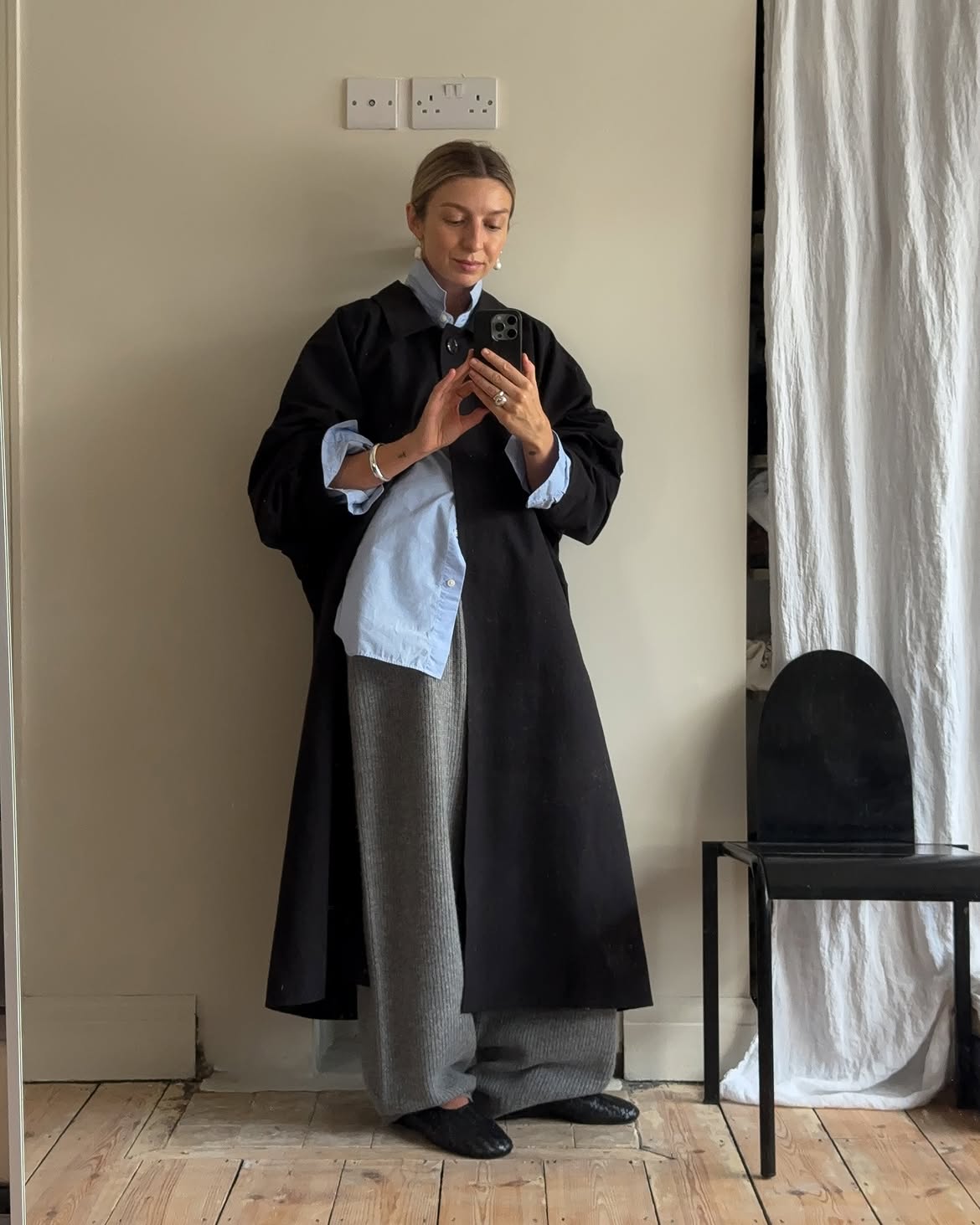 Flared joggers and trench coat.