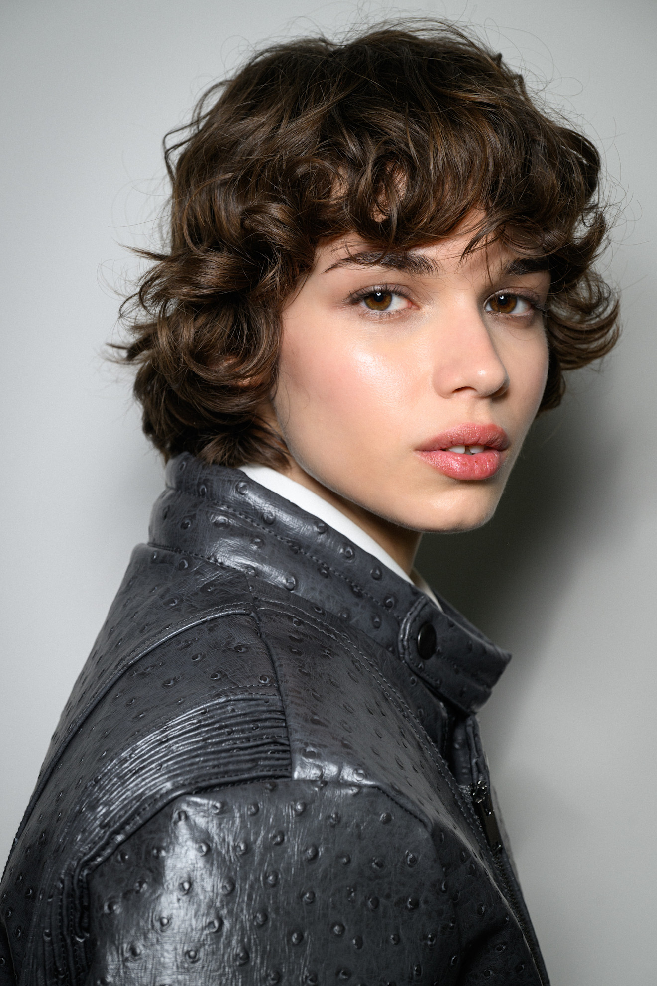 A model showing off an effortless-looking bixie cut.