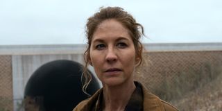 june standing in front of a train tunnel on fear the walking dead season 6