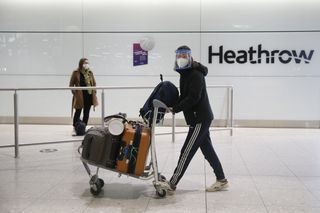 Person returning from one of the red list countries into Heathrow Airport