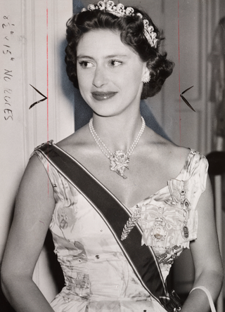 Princess Margaret, 1955." Gelatin silver print. A photograph of Princess Margaret Rose (1930-2002), younger sister of Queen Elizabeth II, in formal dress and tiara