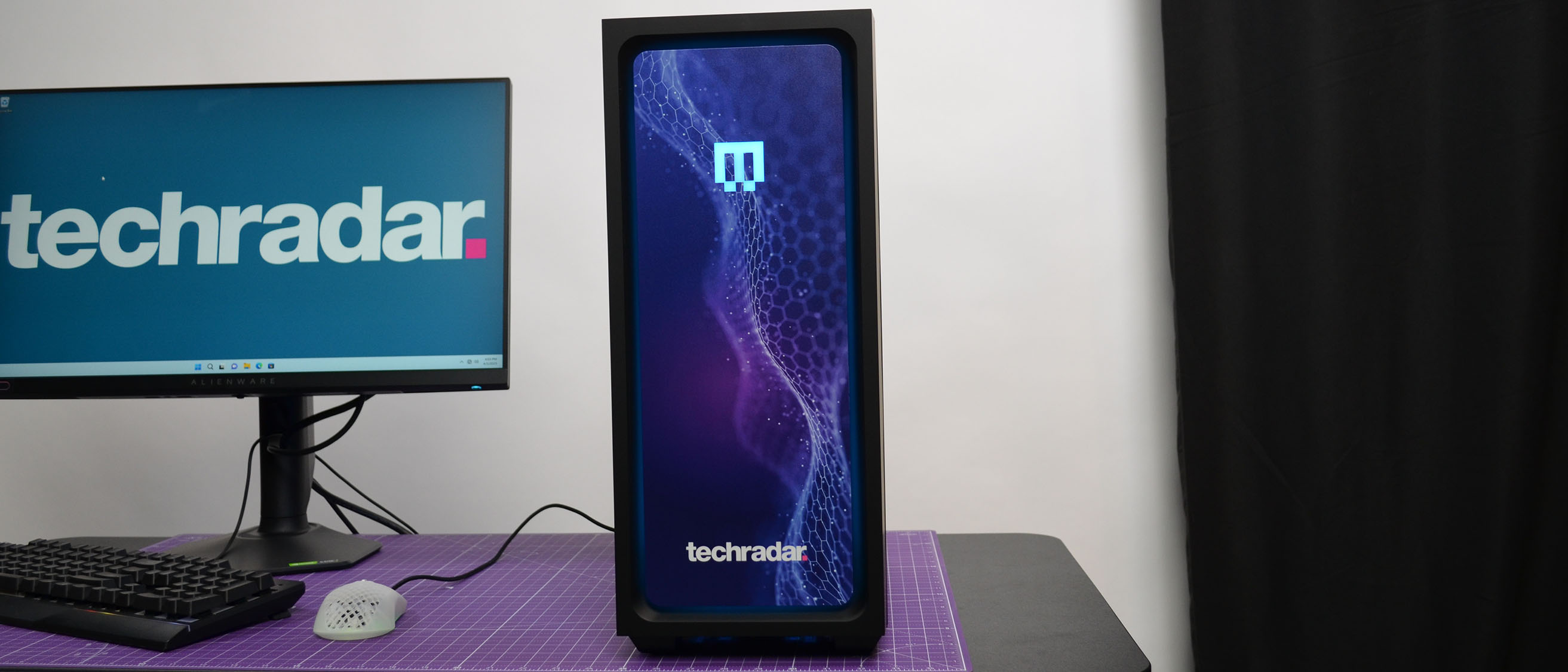 A Maingear MG-1 AMD Advantage gaming PC on a desk