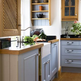 kitchen with wooden flooring and white sink