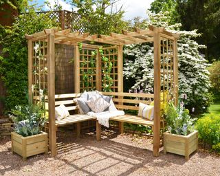 wooden pergola with L shaped eating