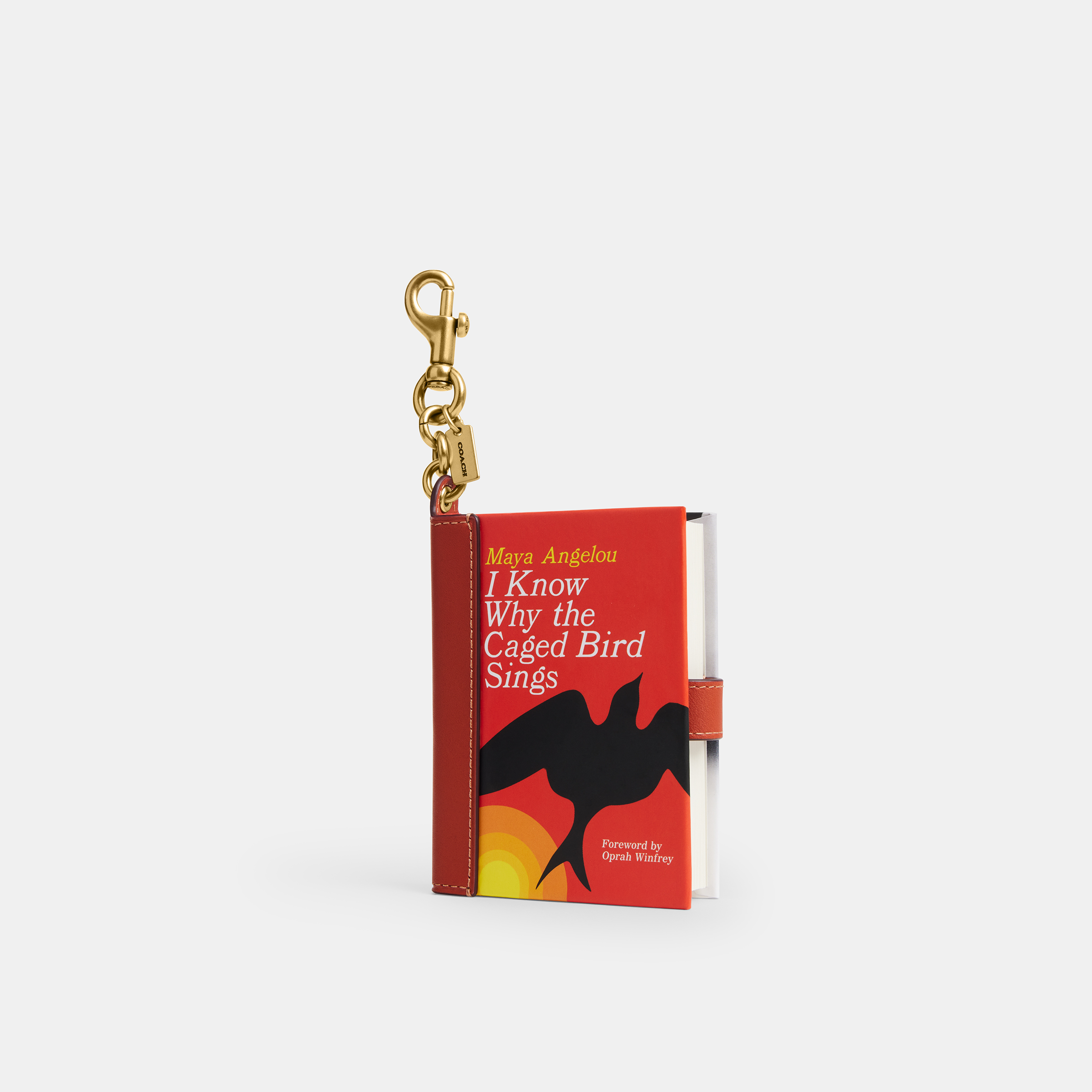 Coach's I Know Why the Caged Bird Sings book charm