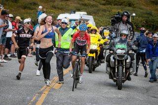 Tom Danielson (Garmin-Sharp) gets cheered on by fans as he crests the top of Independence Pass.