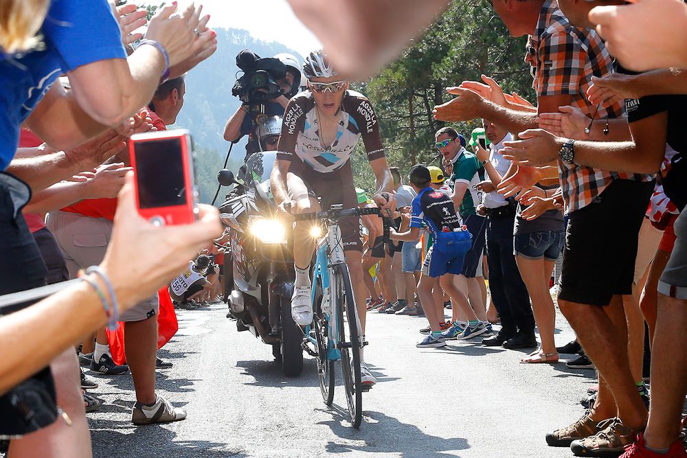 Romain Bardet rides through the spectators during stage 14 of the 2015 Tour de France.
