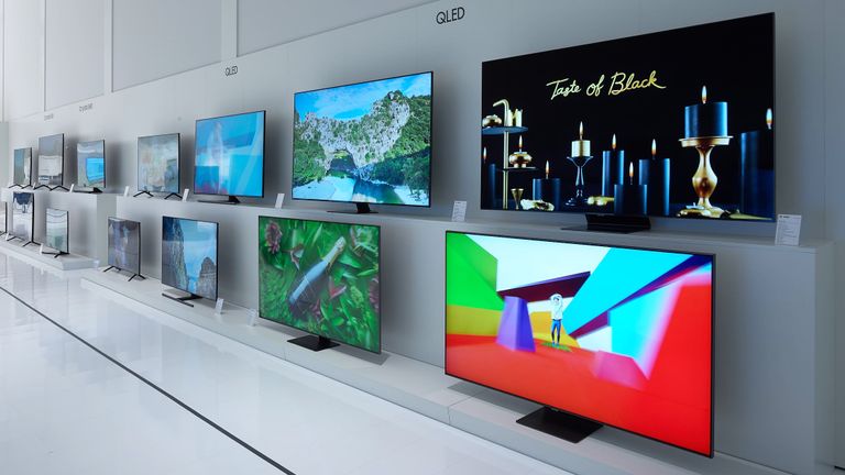Best Samsung TV 2022 image shows lots of Samsung TVs on plinths in a showroom