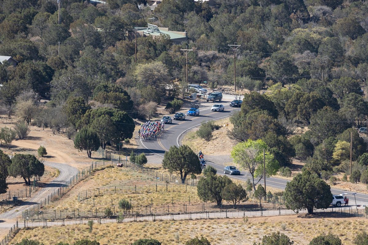 One mile (1.6 km) from the first KOM, the men's field was compressed waiting for someone to attack.
