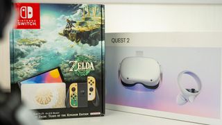 A Meta Quest 2 box next to a Nintendo Switch OLED TOTK Edition box