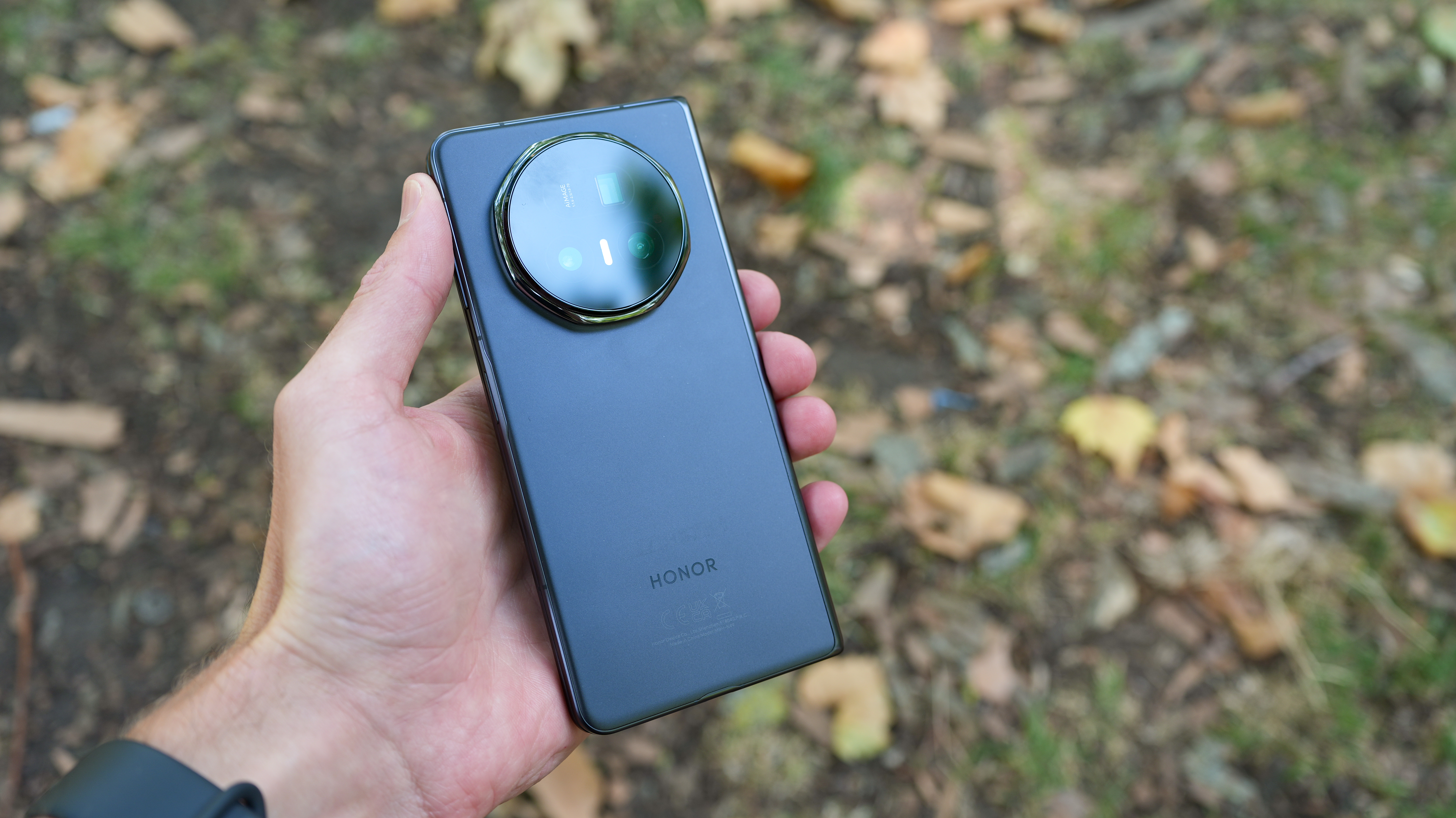 Honor Magic V5 phone held in a hand