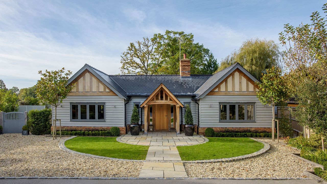 house exterior with open lawn area