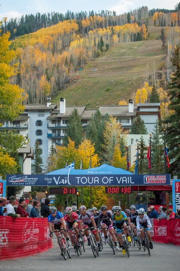 The men's peloton rolls through the start/finish line during the Tour of Vail.