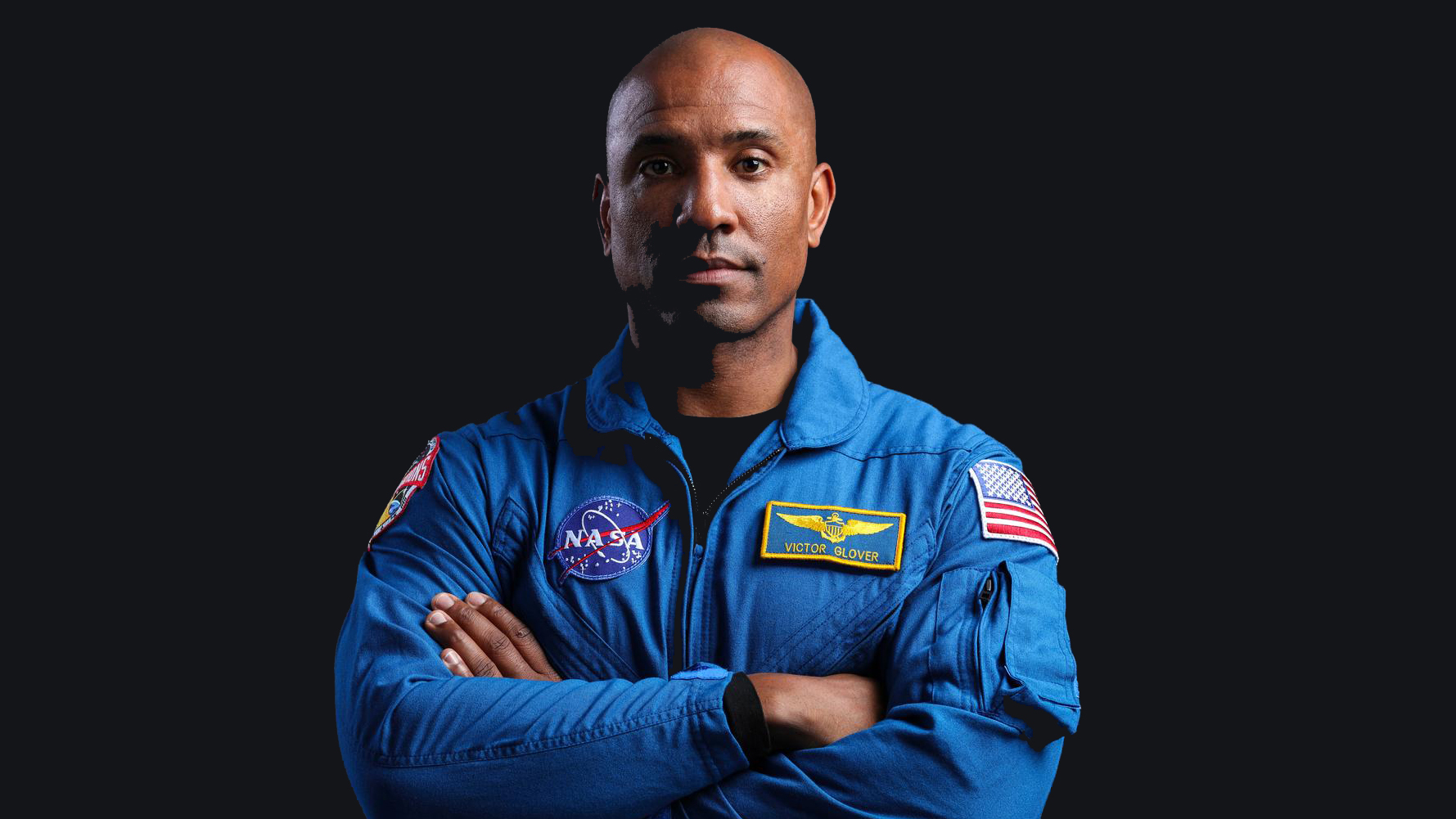 Astronaut Victor Glover against a black background.