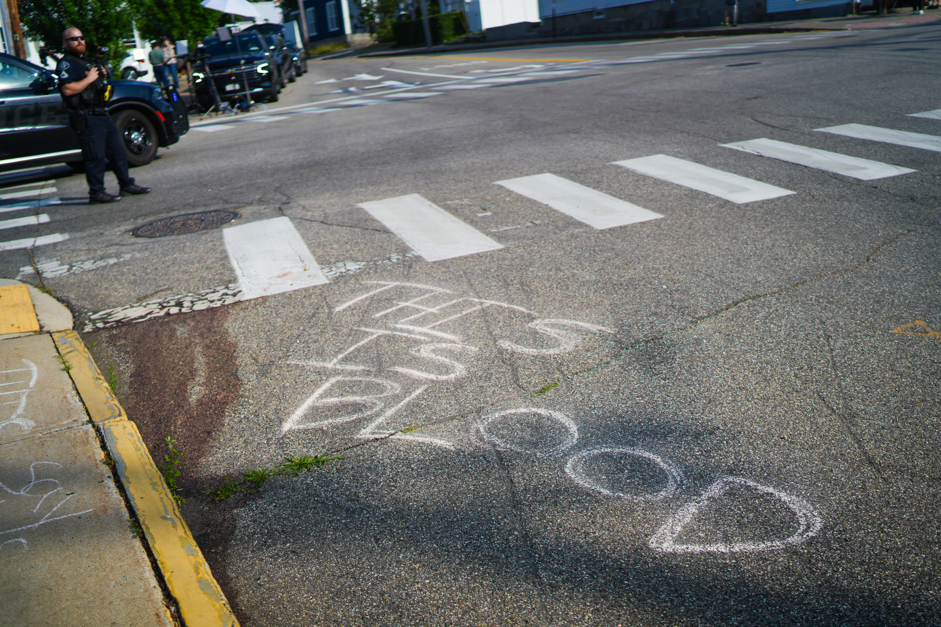 BIDDEFORD, MAINE - JULY 13: Blood is seen on the pavement at the scene of a shooting involving U.S. Immigration and Customs Enforcement(ICE), on July 13, 2026 in Biddeford, Maine. The victim of the shooting has been identified as Joan Sebastian Guerrero, a 26-year-old man from Colombia. (Photo by Ryan Murphy/Getty Images)
