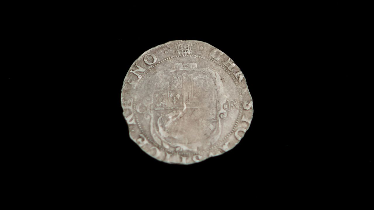The tiny depiction of a portcullis that can be seen at the top of the reverse of the coin is a "maker's mark" showing it was minted in the Tower of London in 1633 or 1634.