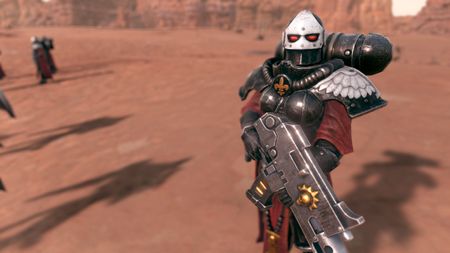 A Sister of Battle with a boltgun stands in the wastes