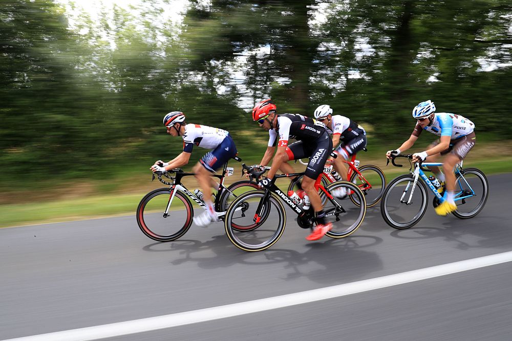 The day's four-man break featuring Oliver Naesen (IAM Cycling), Alexis Gougeard (AG2R-La Mondiale), Markel Irizar (Trek-Segafredo) and Andreas Schillinger (Bora-Argon18).