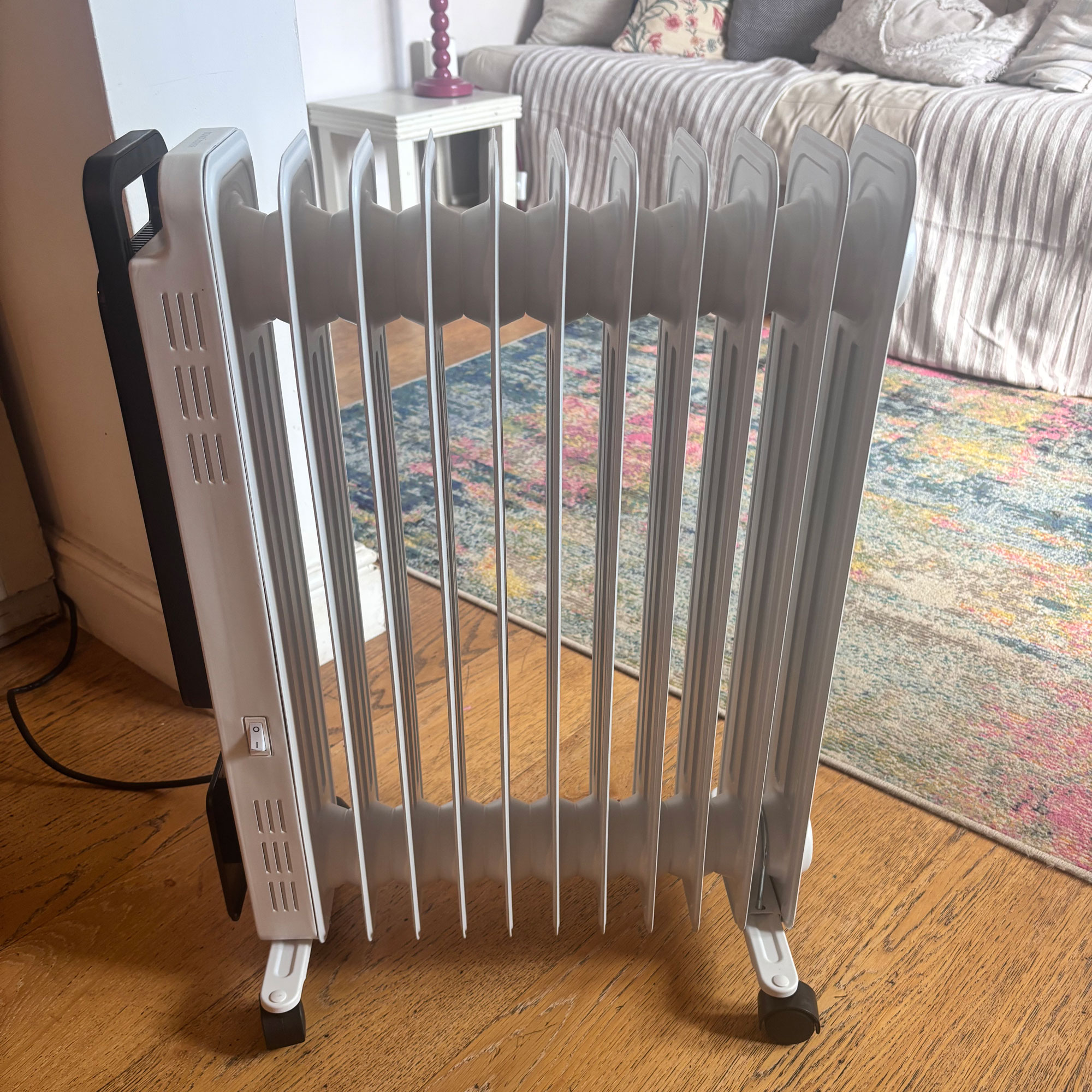 ProBreeze white oil filled radiator on wooden floor