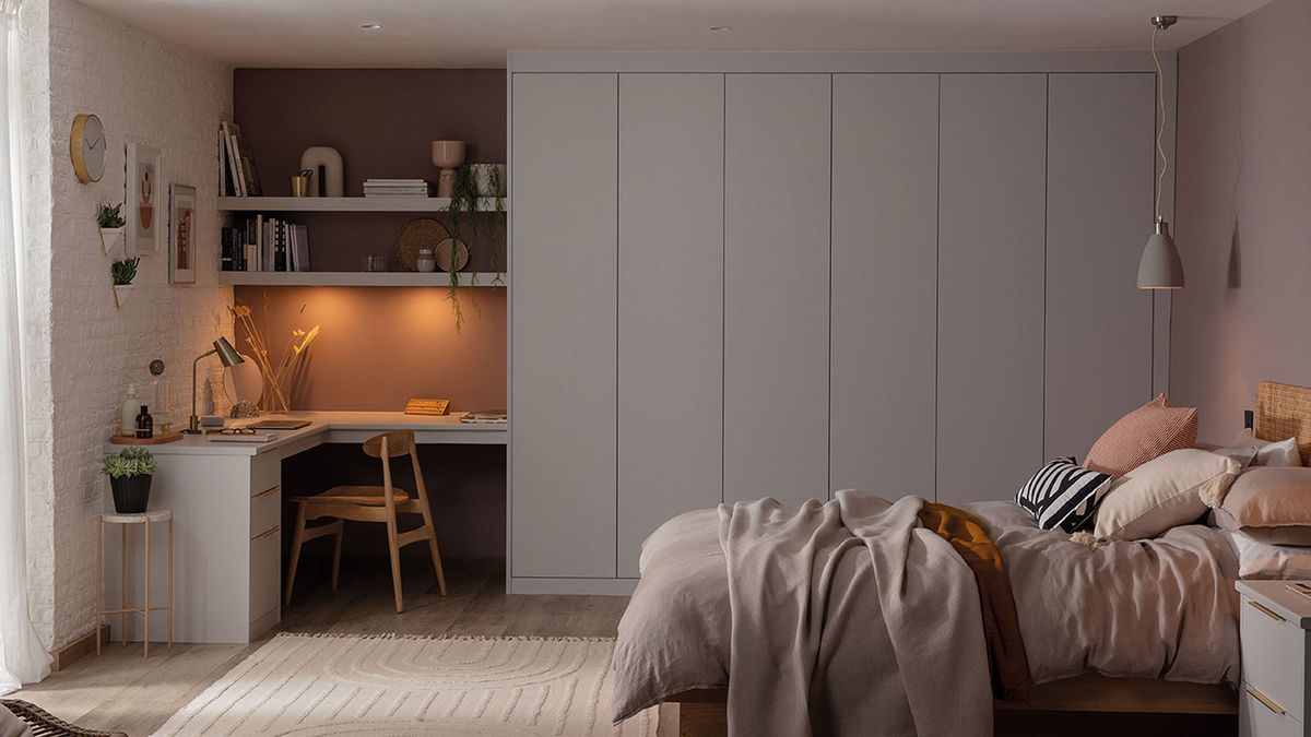 pink bedroom with home office corner