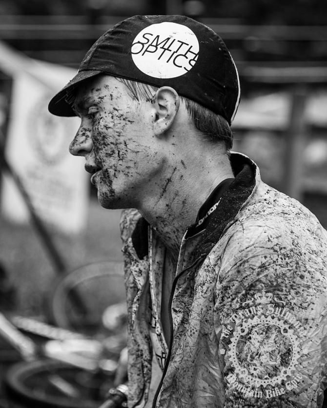 Gunnar Bergey with a muddy face and kit after stage 3 of the Trans-Sylvania Epic.
