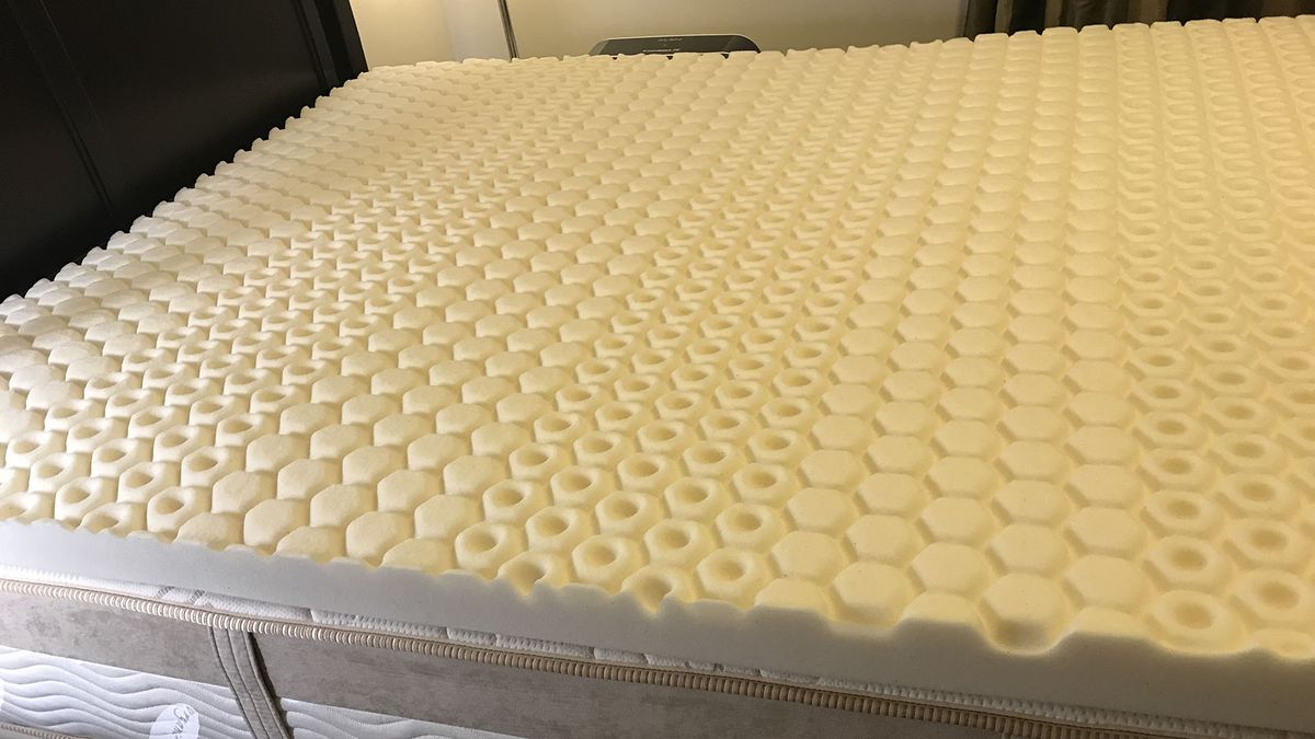 A close-up of the Molecule CopperWell Mattress Topper's open-cell foam surface.