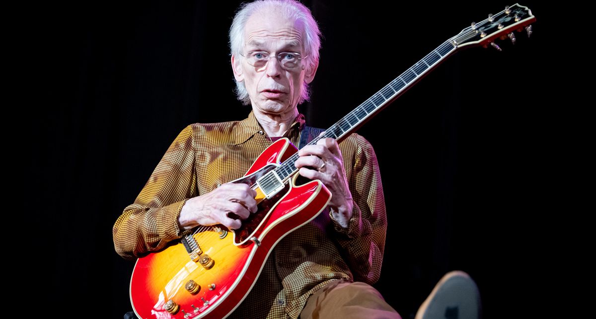 Steve Howe of Yes performs with his Gibson ES-Artist