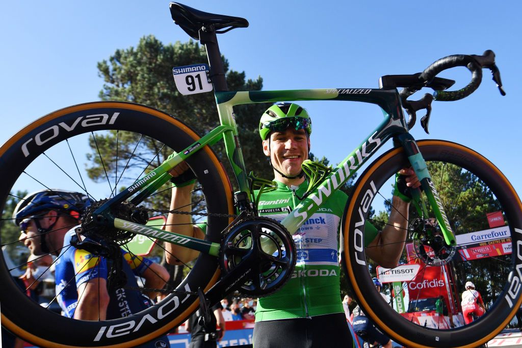 MOS SPAIN SEPTEMBER 04 Fabio Jakobsen of Netherlands and Team Deceuninck QuickStep celebrates after crosses the finishing line the 76th Tour of Spain 2021 Stage 20 a 2022km km stage from Sanxenxo to Mos Alto Castro de Herville 502m lavuelta LaVuelta21 on September 04 2021 in Mos Spain Photo by Stuart FranklinGetty Images
