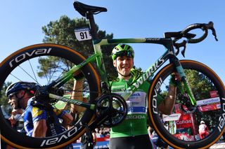 MOS SPAIN SEPTEMBER 04 Fabio Jakobsen of Netherlands and Team Deceuninck QuickStep celebrates after crosses the finishing line the 76th Tour of Spain 2021 Stage 20 a 2022km km stage from Sanxenxo to Mos Alto Castro de Herville 502m lavuelta LaVuelta21 on September 04 2021 in Mos Spain Photo by Stuart FranklinGetty Images