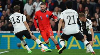 England defender Luke Shaw takes on three Germany players during England 3-3 Germany in the UEFA Nations League on 26 September, 2022 at Wembley Stadium, London, United Kingdom
