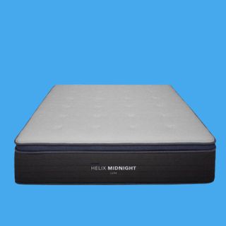 Image shows the Helix Midnight Luxe, our best mattress for side sleepers, on a blue background