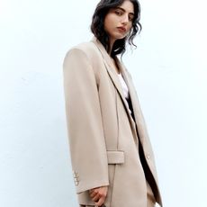 Woman wearing beige blazer