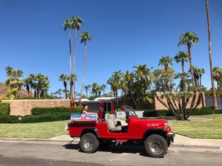 A pitcure of the Desert Adventures Red Tours Jeep in Palm Springs. Sat in the Jeep is Helena Cartwright, out travel writer