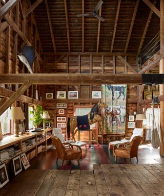 Eclectic living area in Isabella Rossellini's Long Island rustic barn