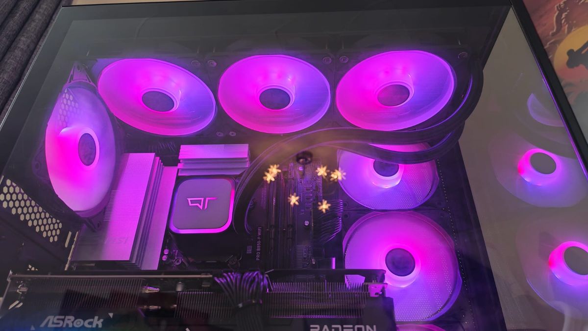 Pink fan RGB lighting inside a Quoted Tech Horizon Custom gaming PC