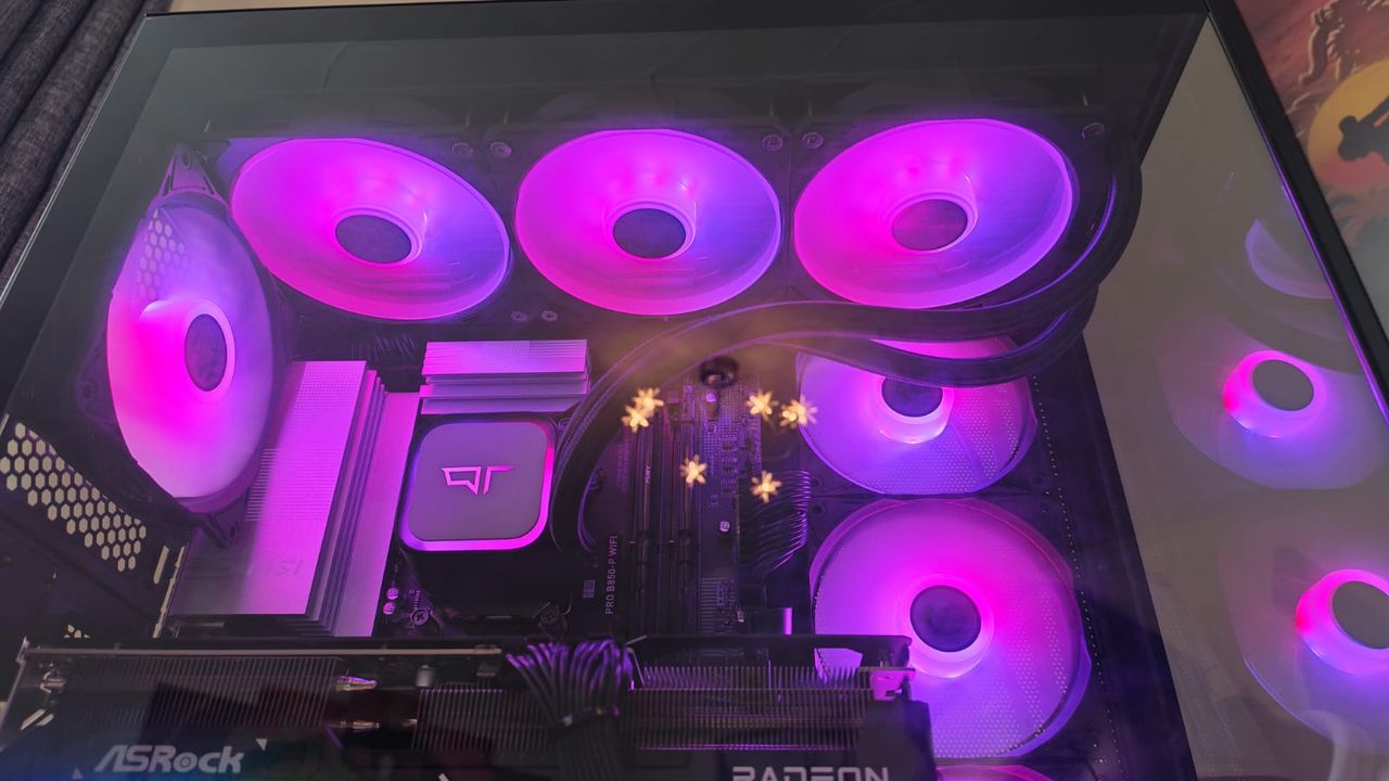 Pink fan RGB lighting inside a Quoted Tech Horizon Custom gaming PC
