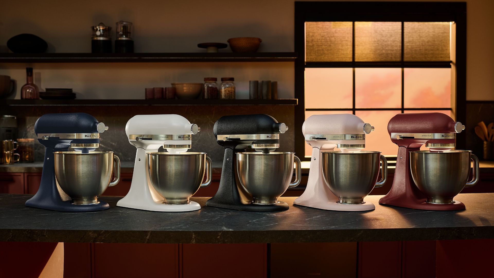 The KitchenAid Artisan Plus Tilt-Head 4.7L Stand Mixer lined up on the counter