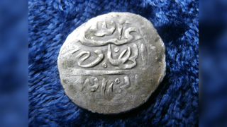 The 1693 Yemeni silver coin found in 2014 in Rhode Island. Similar similar coins have since been unearthed at American colonial sites.