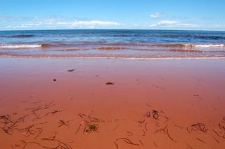 red sand beach