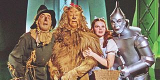 Dorothy, the Cowardly Lion, and Scarecrow in The Wizard of Oz