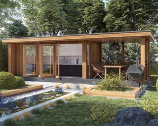 cedar clad garden room with bi-fold doors and covered patio