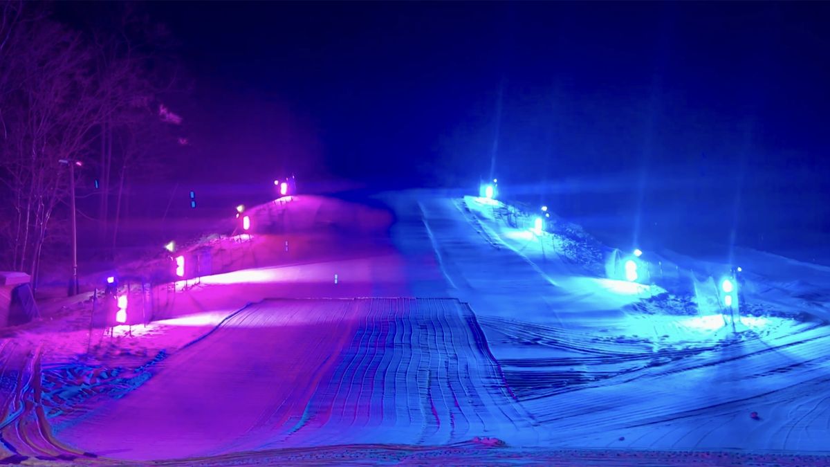 A ski slope alit in pink and blue with lighting solutions from GLP.