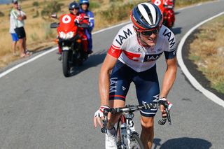 Matthias Frank on the attack during stage 6 at the Vuelta a Espana