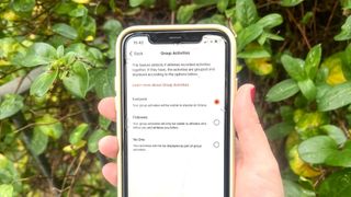 Strava group activity privacy settings on an iPhone screen