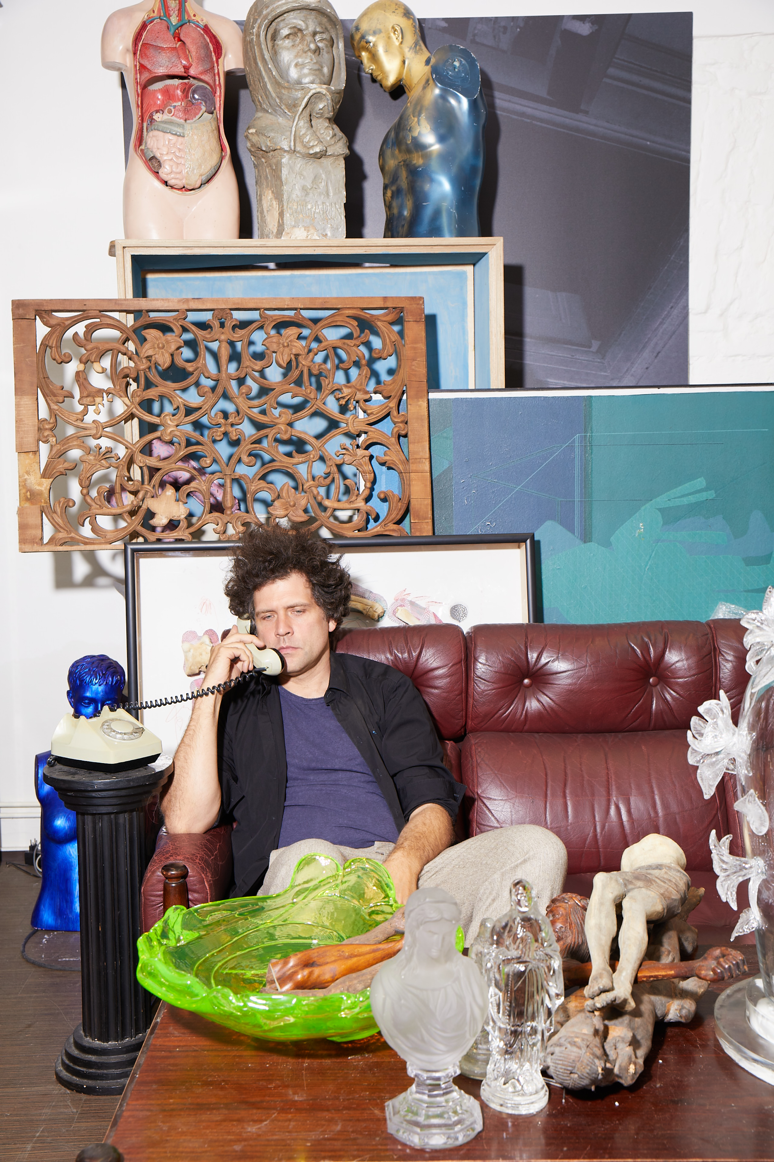 Maxim Vel&amp;#269;ovsk&amp;yacute; in his art and collectibles-packed studio.