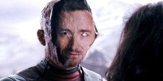 Deadpool wearing a Hugh Jackman Mask